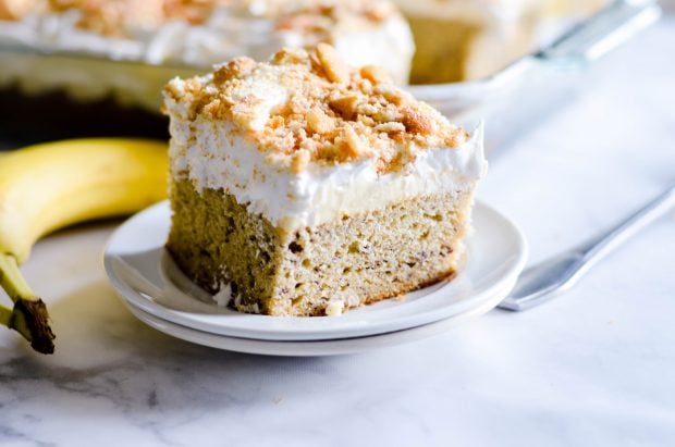 This homemade Banana Pudding Cake starts with a deliciously moist cake made with buttermilk. Then it’s topped with classic layers of Southern banana pudding, whipped topping and finished with crumbled vanilla wafer cookies.