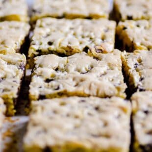 You're just a few easy ingredients away from these Lazy Day Cookie Cake Bars. Serve with ice cream and chocolate sauce!