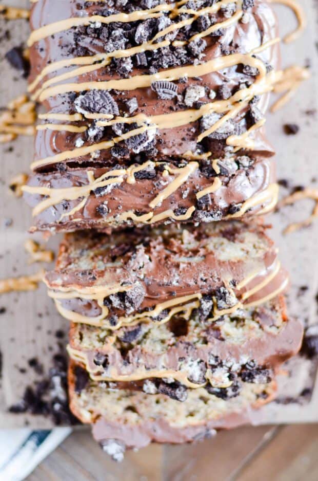 Triple the peanut butter in this sweet banana bread with a decadent cookies & cream packed ganache on top!