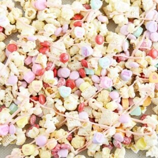 Kettle corn, chex cereal, and your favorite Valentine's Day candy coated in white chocolate.