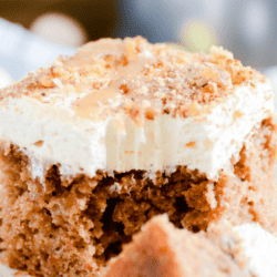 Carrot cake soaked in a homemade caramel sauce topped with a cream cheese whipped topping. This is an Easter show stopper!